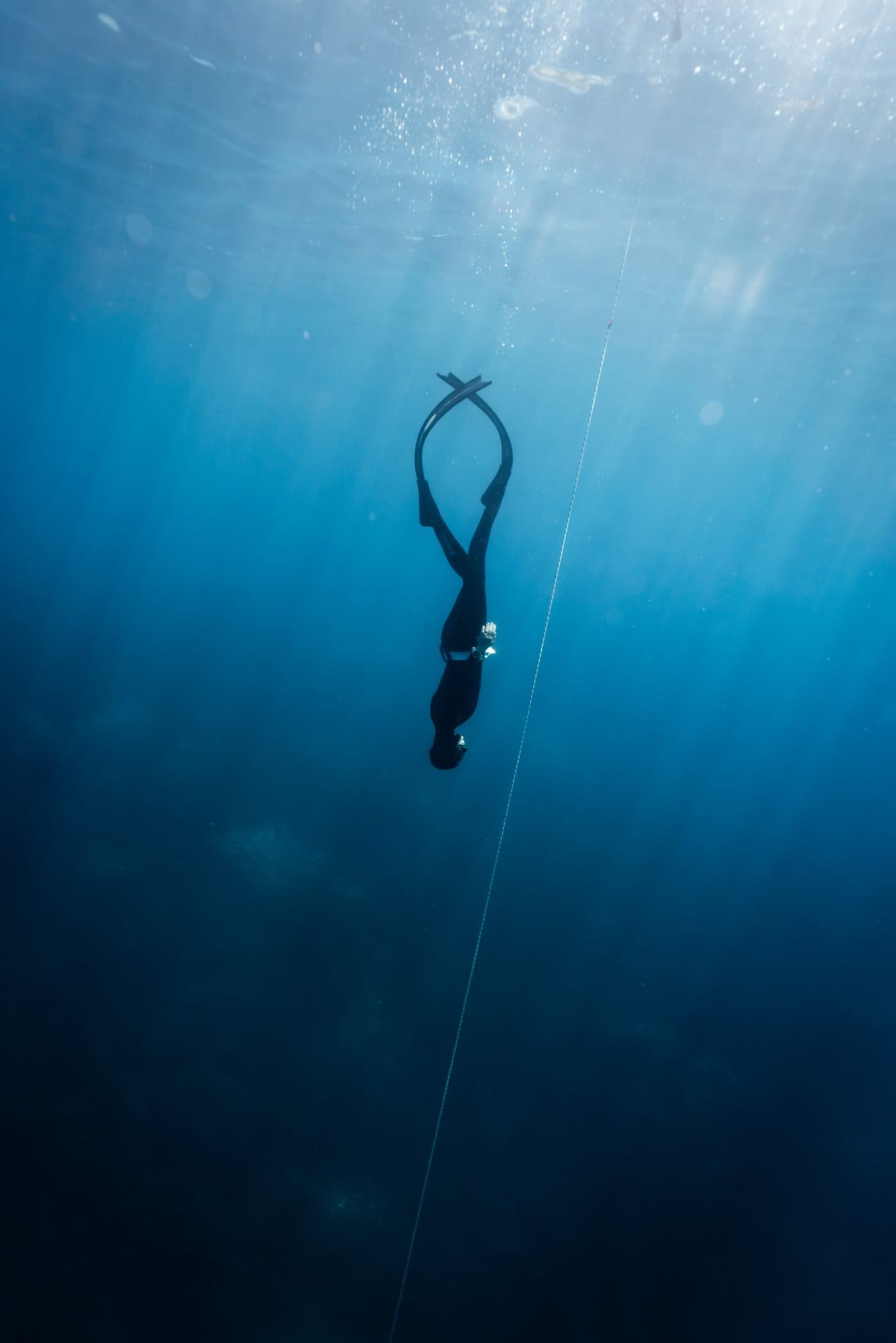 Freediver underwater in clear Ibiza waters